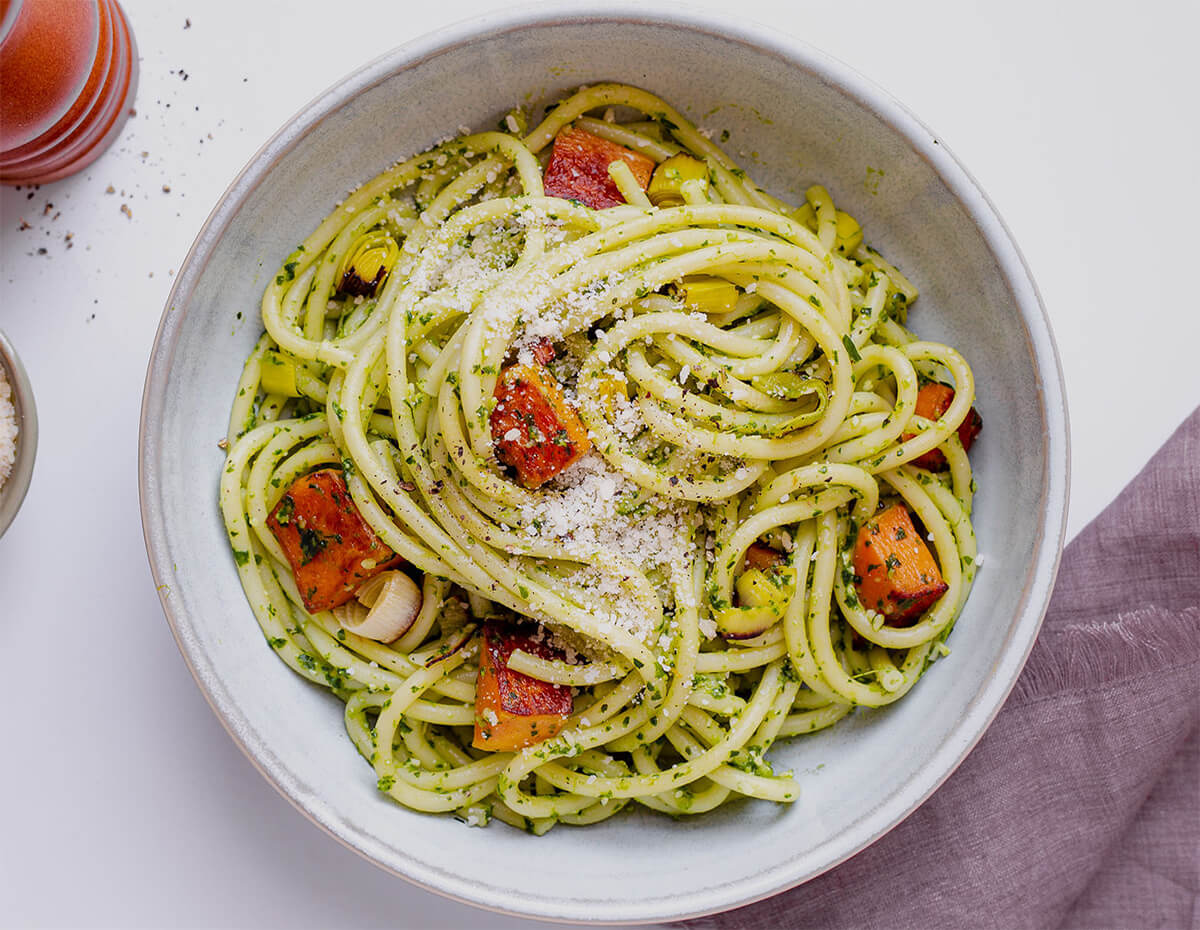 A bowl of bucatini with butternut squash & winter pesto