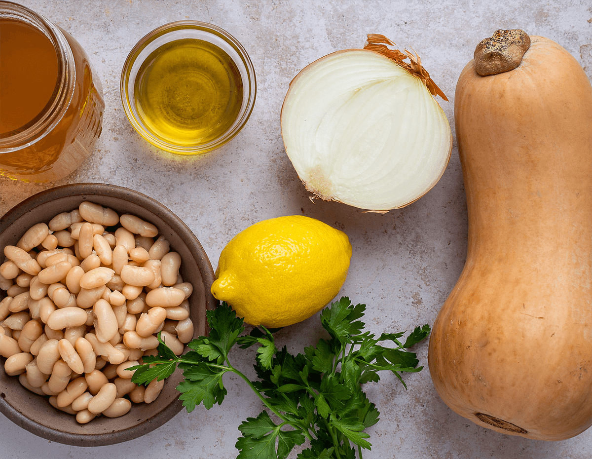 The ingredients in some cannellini bean and butternut squash soup with lemon zest