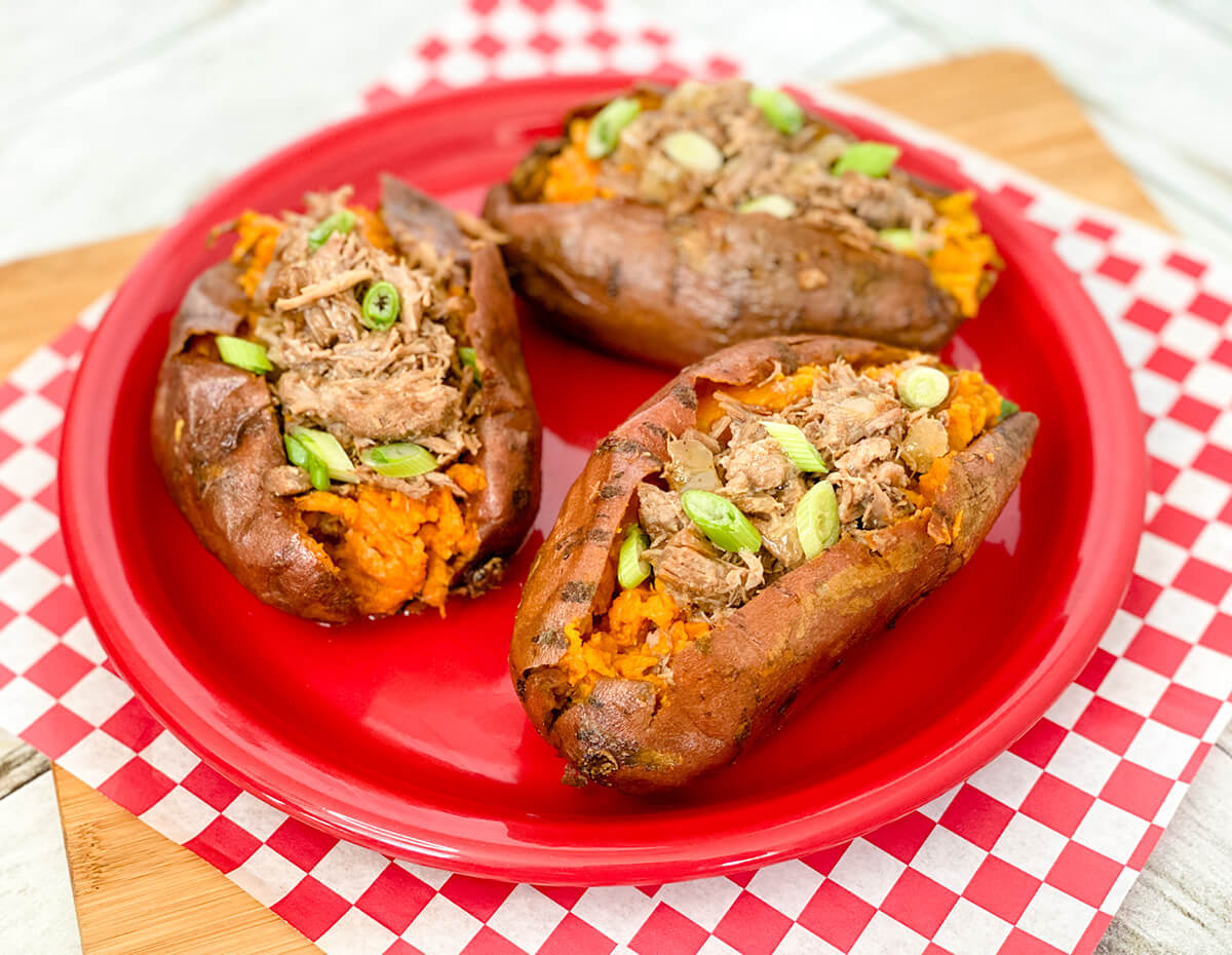 Some tasty baked sweet potatoes stuffed with high-protein pulled pork