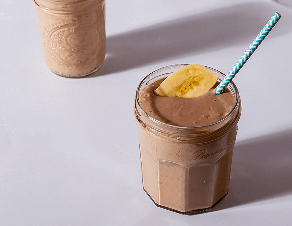 a glass of banana yogurt smoothie