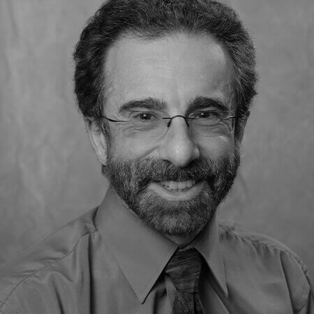 A portrait of CNC board member Joel Epstein