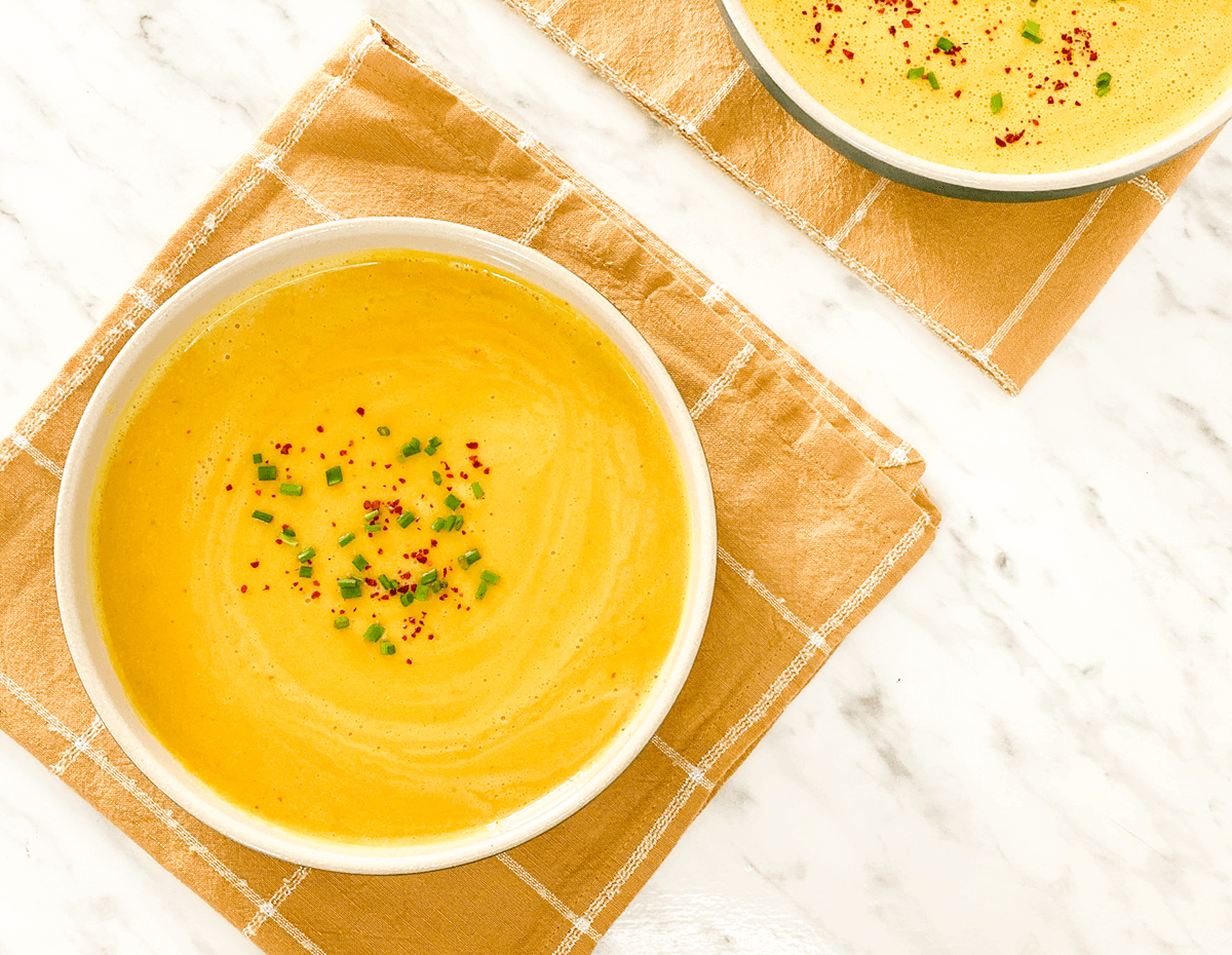 A top down view of some delicious bowl of middle eastern red lentil soup