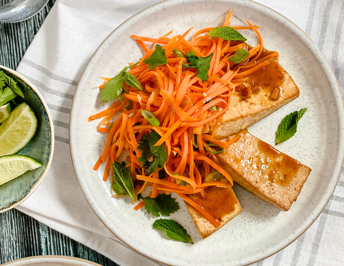 A plate of roasted tofu and slaw