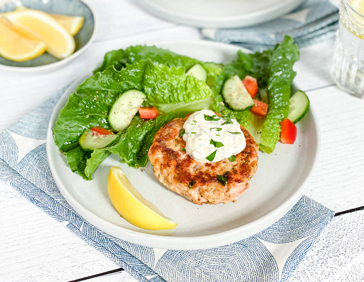 Some tasty salmon cakes served with a side salad