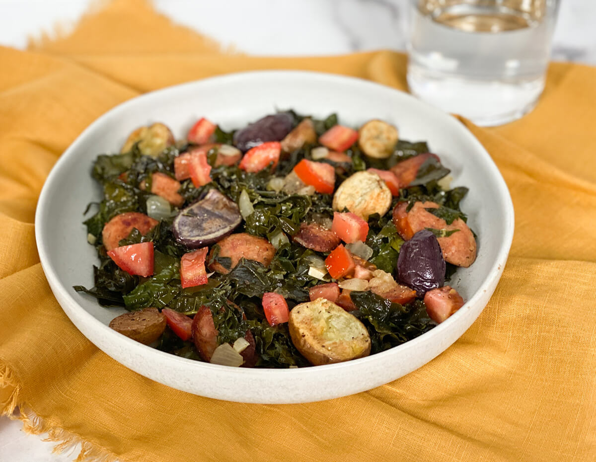 A bowl of skillet kale and sausage