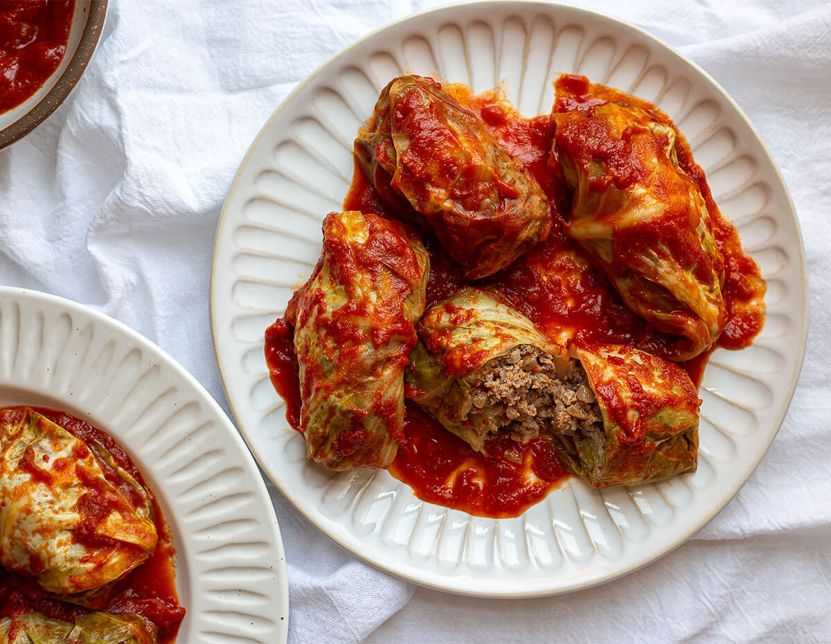 Some tasty stuffed cabbage on a white plate
